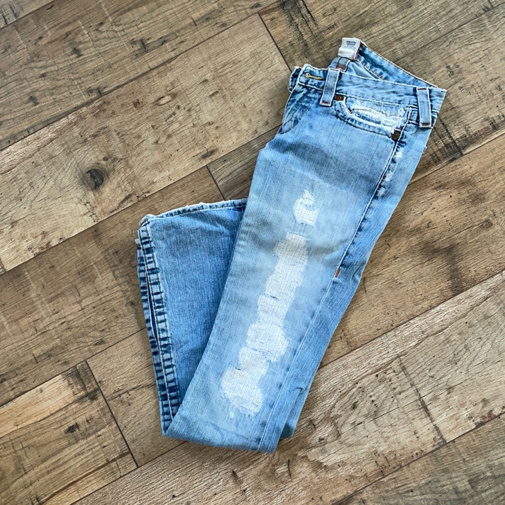 Very flattering,distressed True Religion jeans